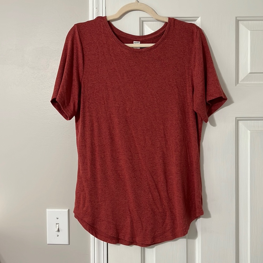 Red short sleeve shirt.